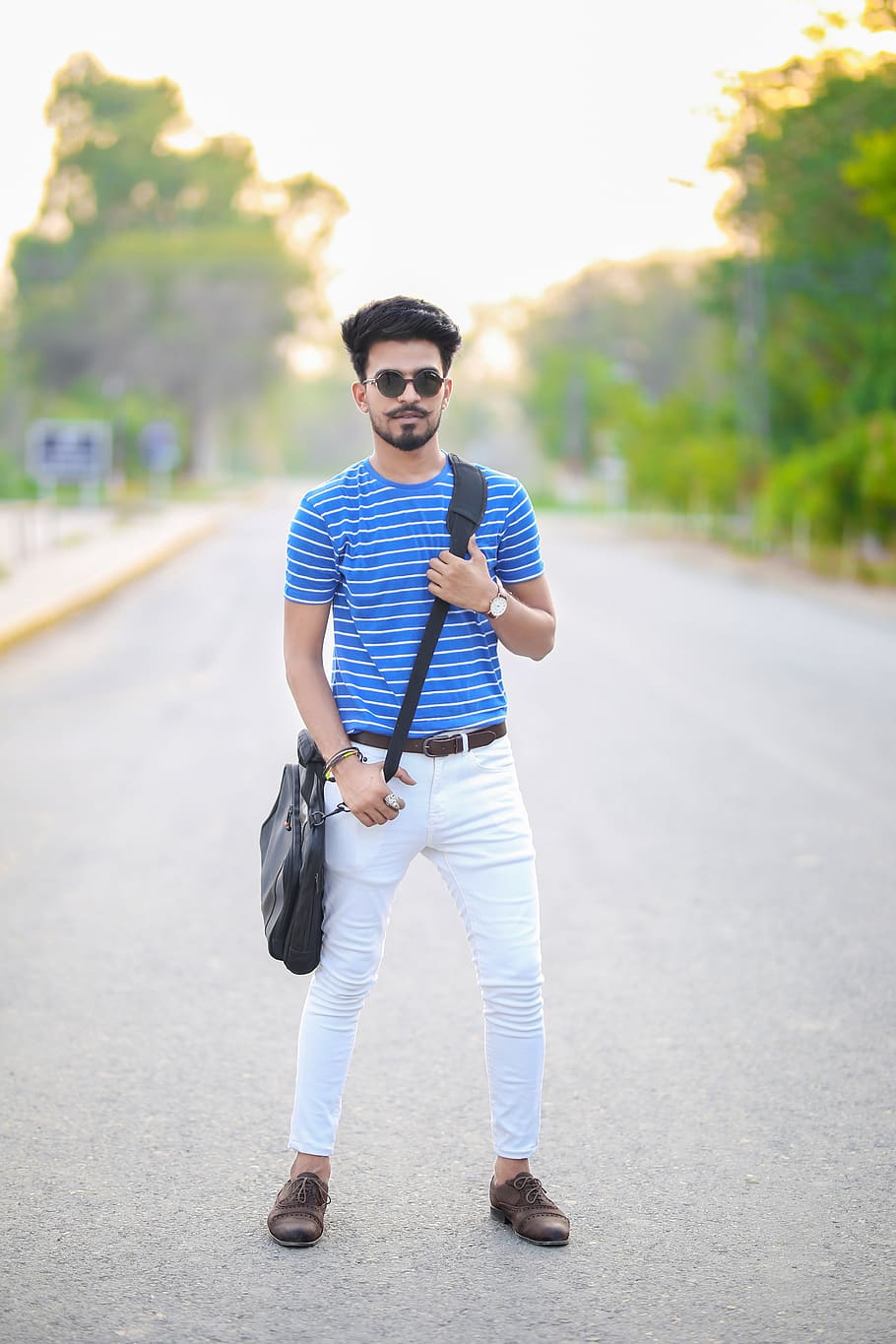 pakistani boy model portrait posing outdoors person